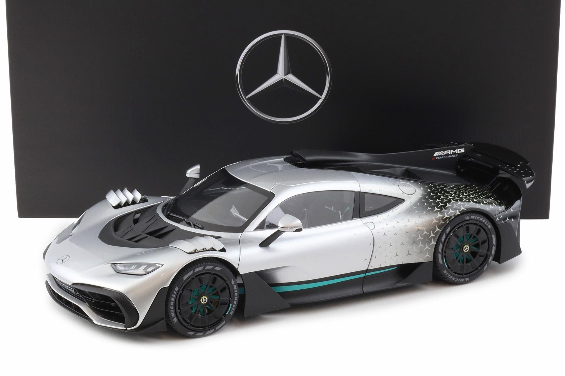 NZG 2023 Mercedes Benz One AMG (C298) Hightech Silver 1:12 DEALER EDITION
