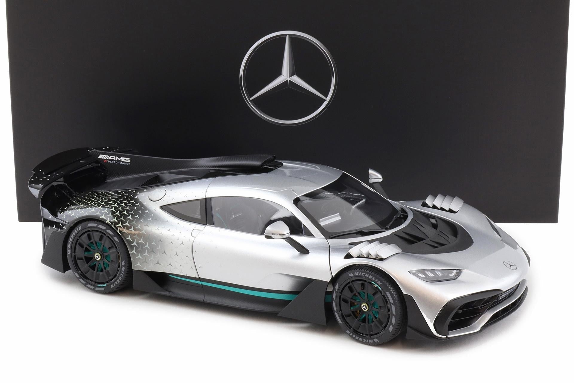 NZG 2023 Mercedes Benz One AMG (C298) Hightech Silver 1:12 DEALER EDITION